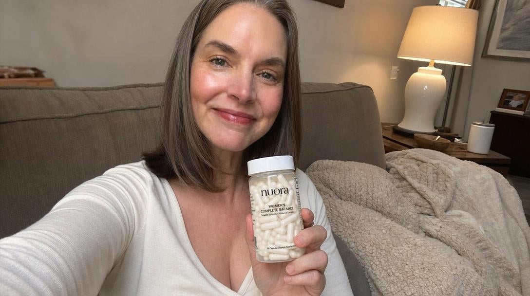 Corinne holding Nuora at home